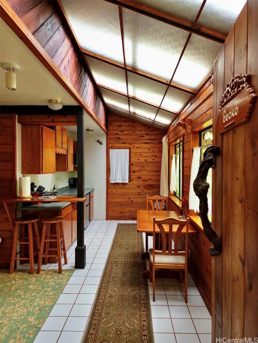 11-3832 2nd Street Volcano, HI 96785 - Photo 14 of 25 a view of a chairs and table in a patio