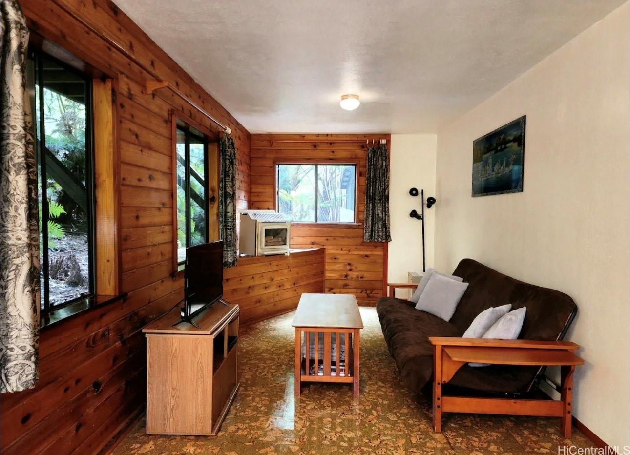 11-3832 2nd Street Volcano, HI 96785 - Photo 19 of 25 a outdoor living space with furniture and a flat screen tv