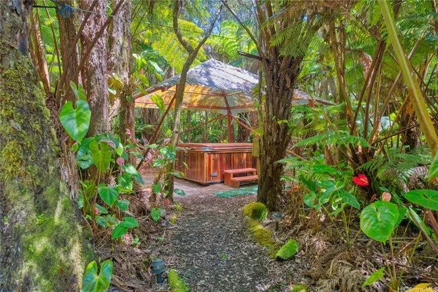 a backyard of a house with lots of green space