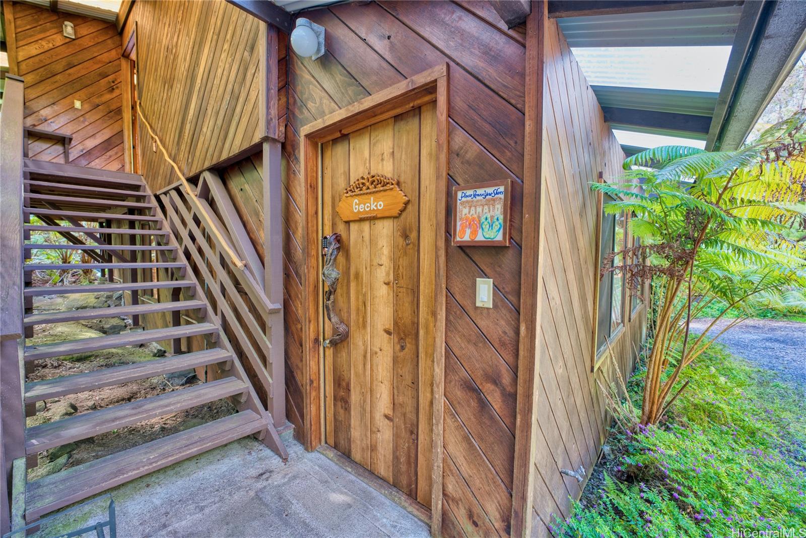 11-3832 2nd Street Volcano, HI 96785 - Photo 7 of 25 a view of a house with a door and wooden floor