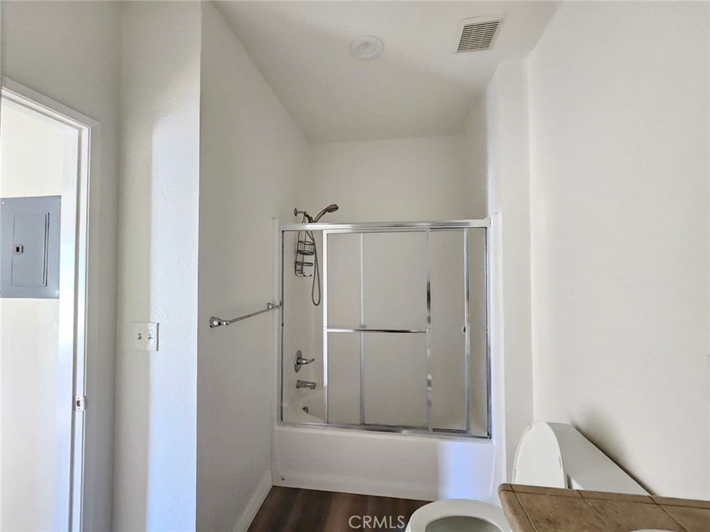 7331 Shelby Place, Unit 121 Rancho Cucamonga, CA 91739 - Photo 14 of 20 a bathroom with a shower and toilet