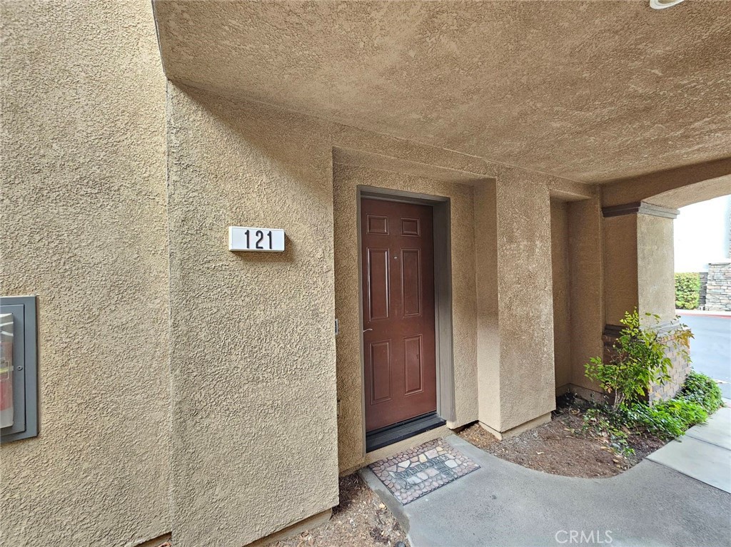7331 Shelby Place, Unit 121 Rancho Cucamonga, CA 91739 - Photo 2 of 20 a view of front door