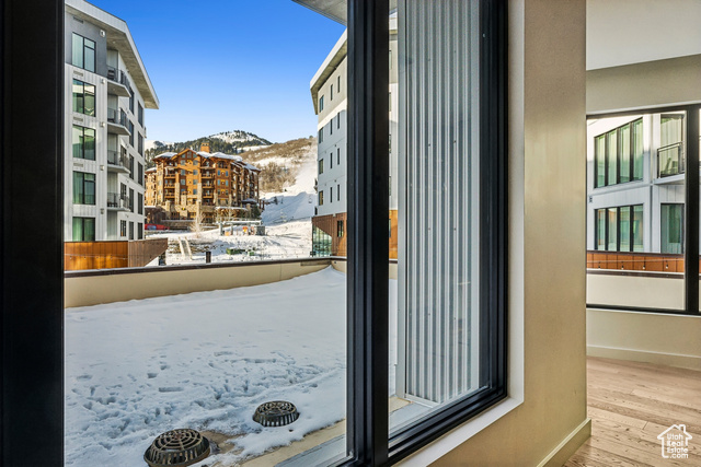 2417 West High Mountain Road, Unit 2202 Park City, UT 84098 - Photo 4 of 28 Entryway featuring light wood-type flooring and a mountain view