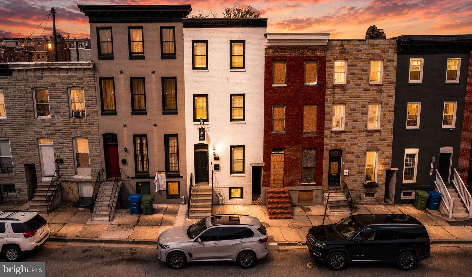 1612 East Chase Street Baltimore, MD 21213 - Photo 46 of 48 a car parked in front of a building