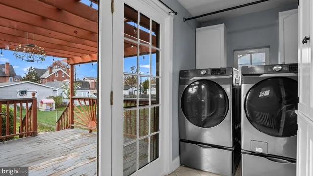 a utility room with dryer and washer