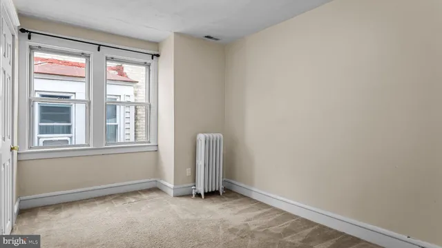 an empty room with a window