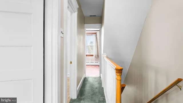 a view of hallway with stairs
