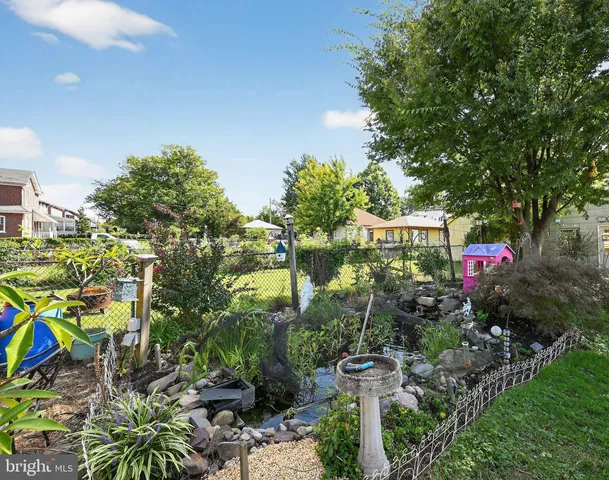 a view of street with sitting area