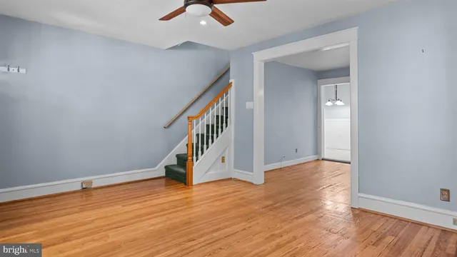 a view of an entryway with wooden floor