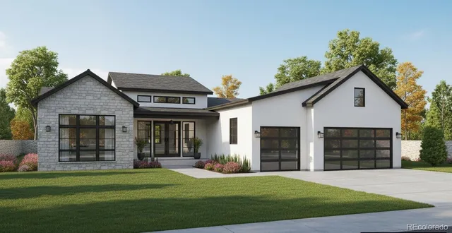a front view of a house with a garden and plants