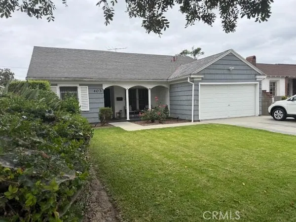 front view of a house with yard