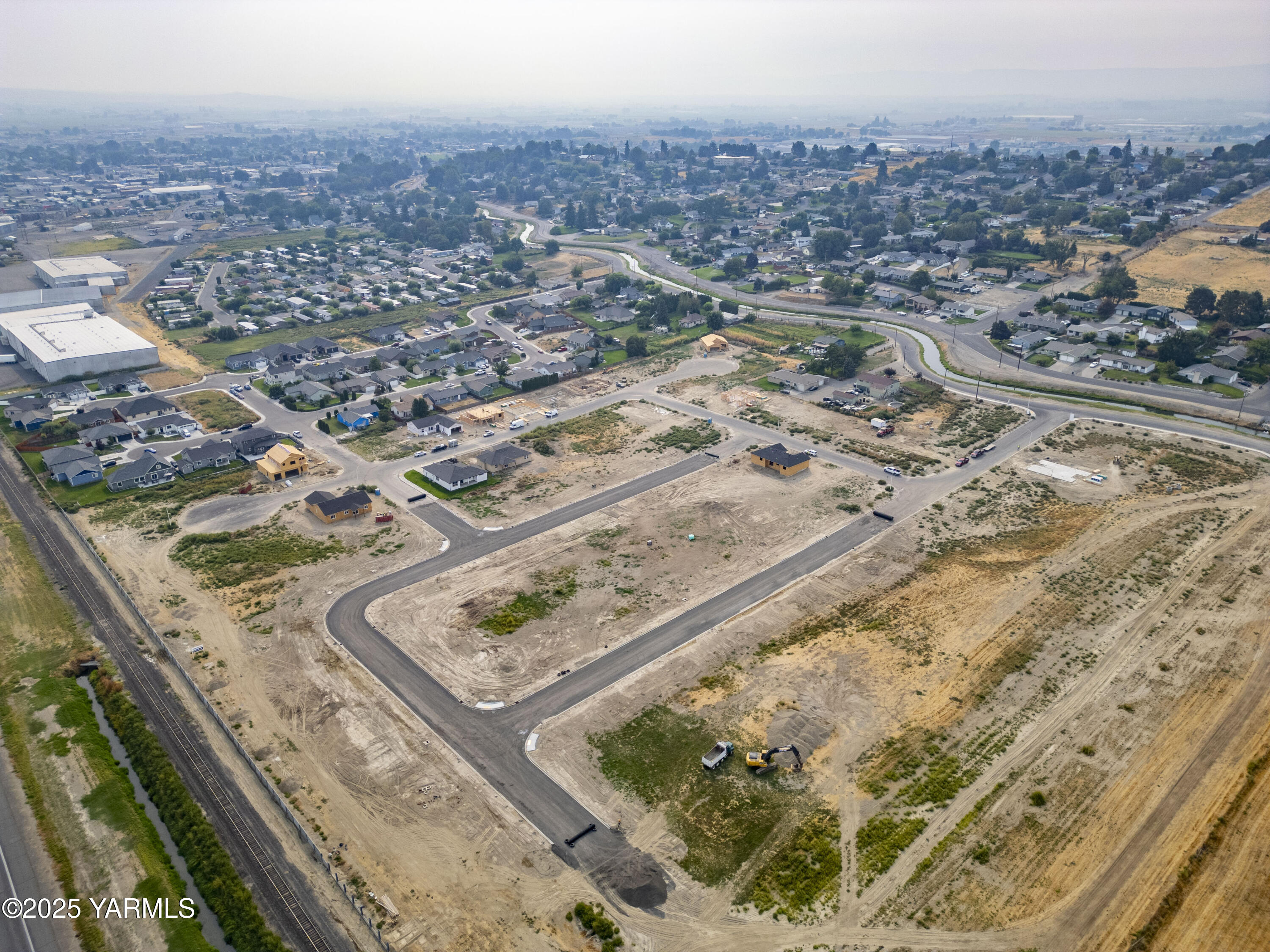 Tbd Tbd Estates Sunnyside, WA 98944 - Photo 10 of 11 an aerial view of residential houses with outdoor space