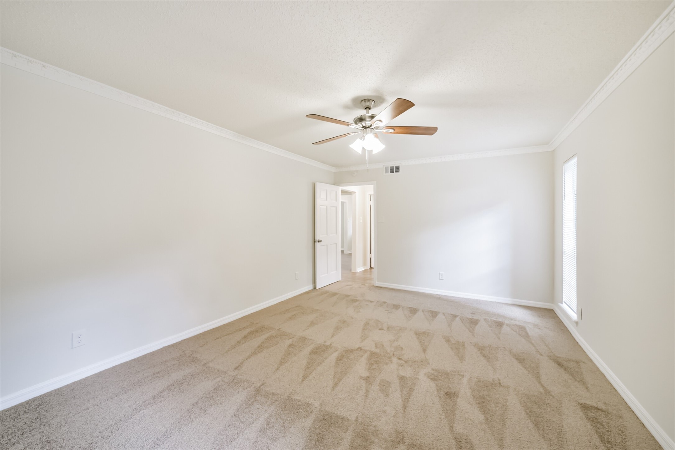 1011 Baltic Lane Houston, TX 77090 - Photo 25 of 43 a view of an empty room with a window