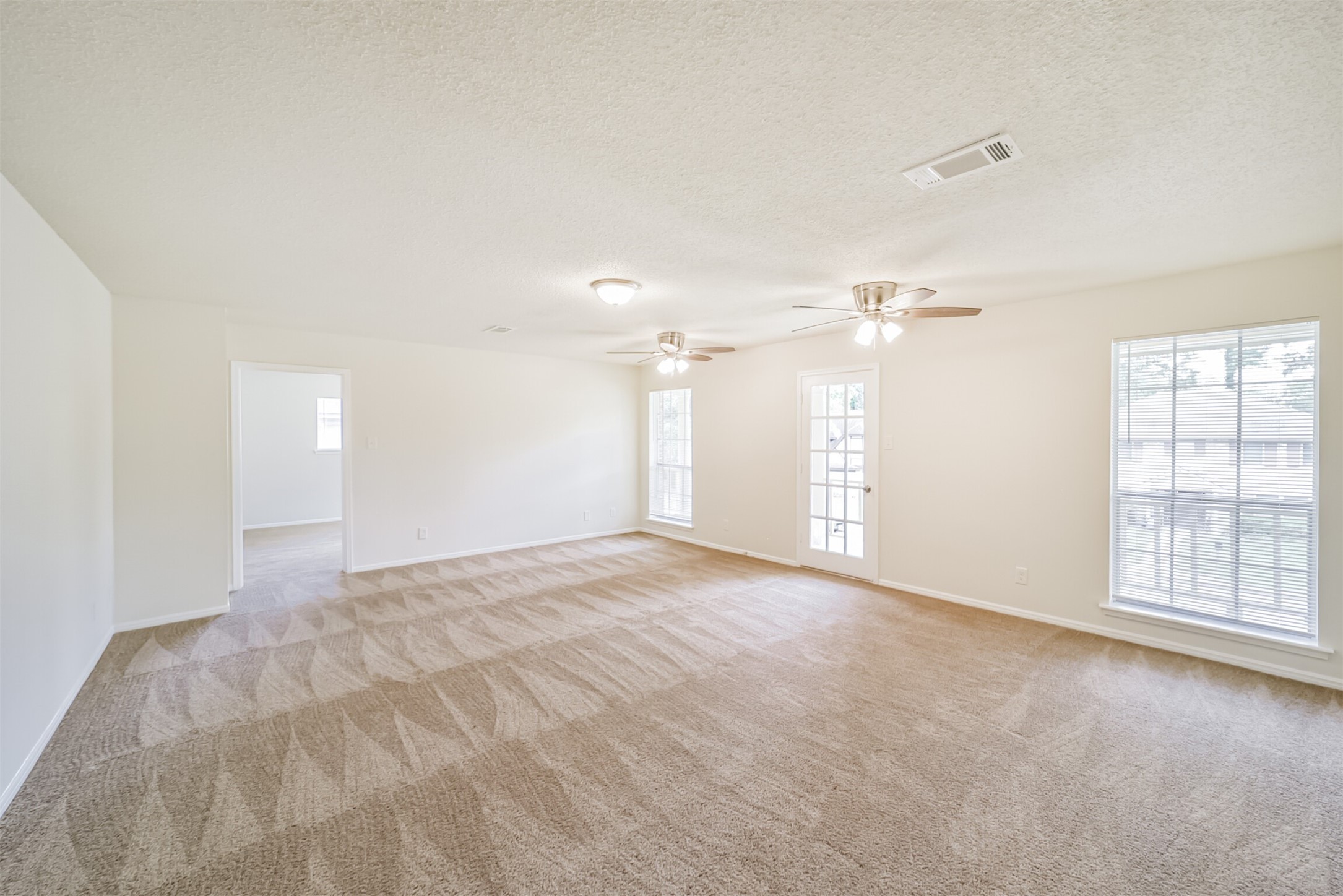 1011 Baltic Lane Houston, TX 77090 - Photo 37 of 43 a view of an empty room with a window