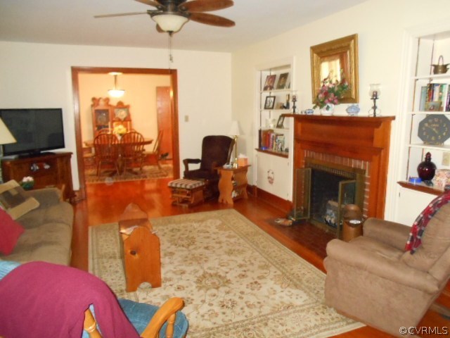 10 Jamestown Road Farmville, VA 23901 - Photo 8 of 20 a living room with furniture a flat screen tv and a fireplace