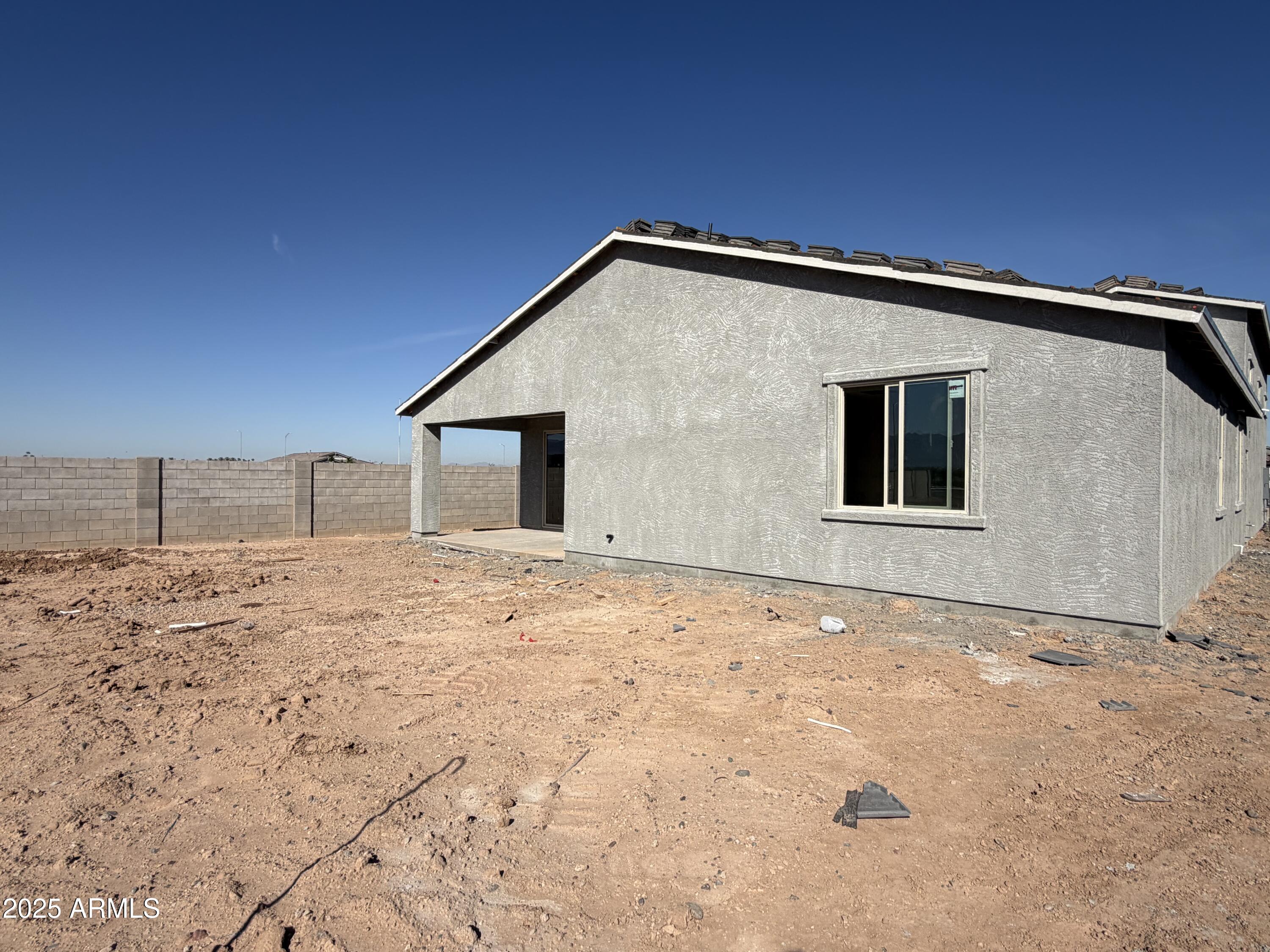 5613 West Hopi Trail Laveen, AZ 85339 - Photo 12 of 25 a view of a house with a backyard