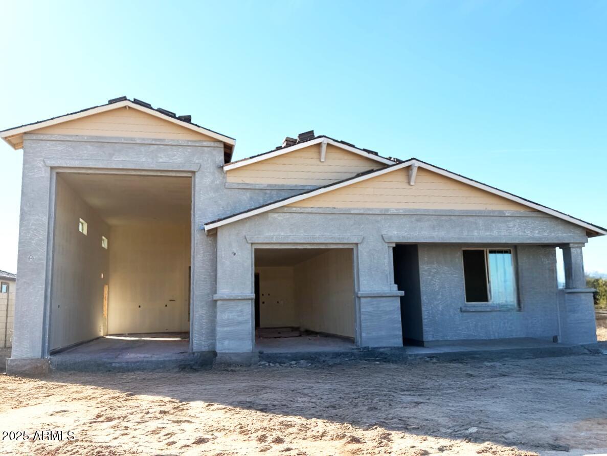 5613 West Hopi Trail Laveen, AZ 85339 - Photo 2 of 25 a front view of a house