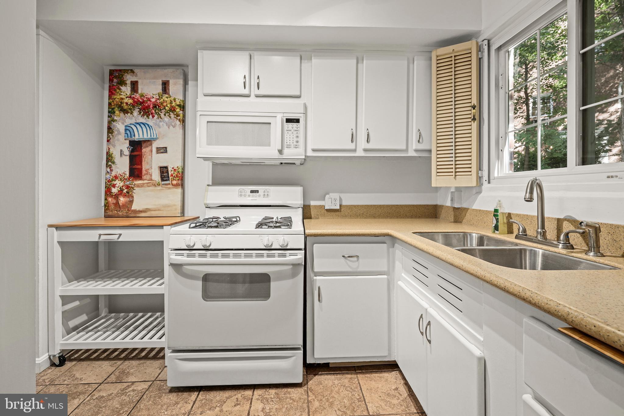 3519 Valley Drive Alexandria, VA 22302 - Photo 12 of 54 a kitchen with cabinets appliances and a sink