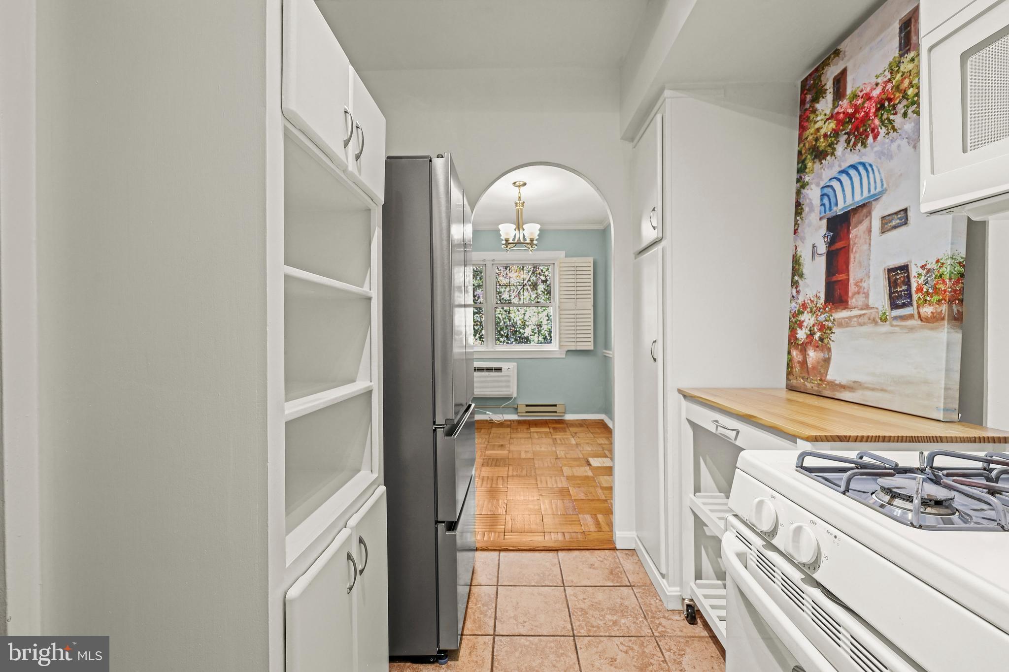 3519 Valley Drive Alexandria, VA 22302 - Photo 13 of 54 a kitchen with stainless steel appliances granite countertop a stove and a sink