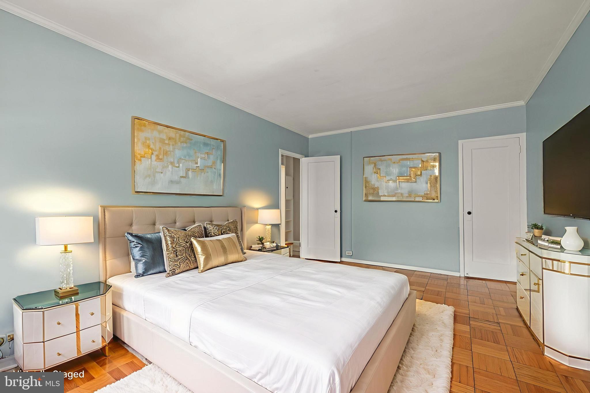 3519 Valley Drive Alexandria, VA 22302 - Photo 17 of 54 a bedroom with a bed and a flat screen tv