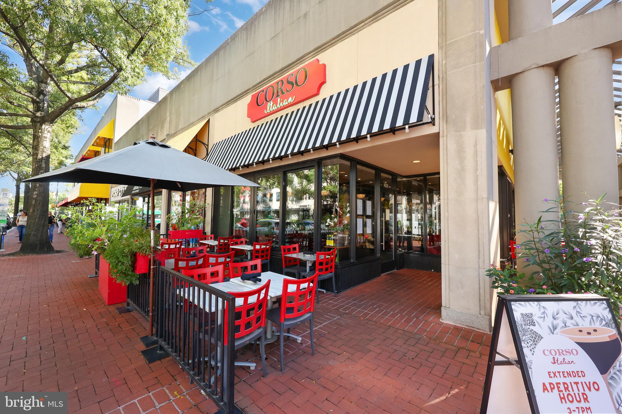 3519 Valley Drive Alexandria, VA 22302 - Photo 34 of 54 an outdoor seating area with furniture and umbrella