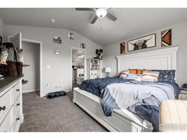 a bathroom with a sink a large mirror and a bathtub