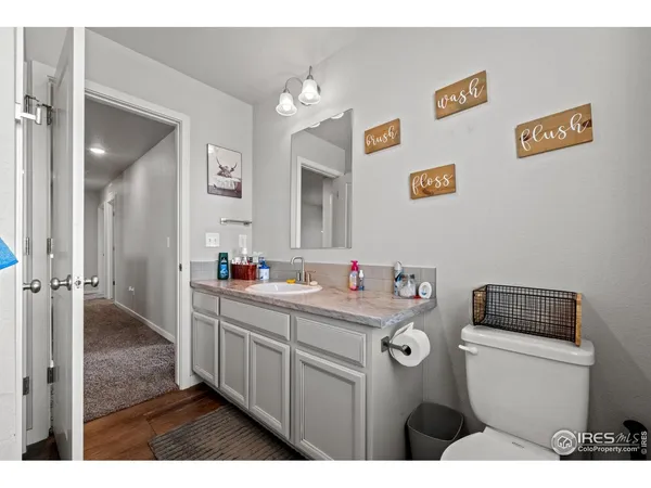 a utility room with sink dryer and washer