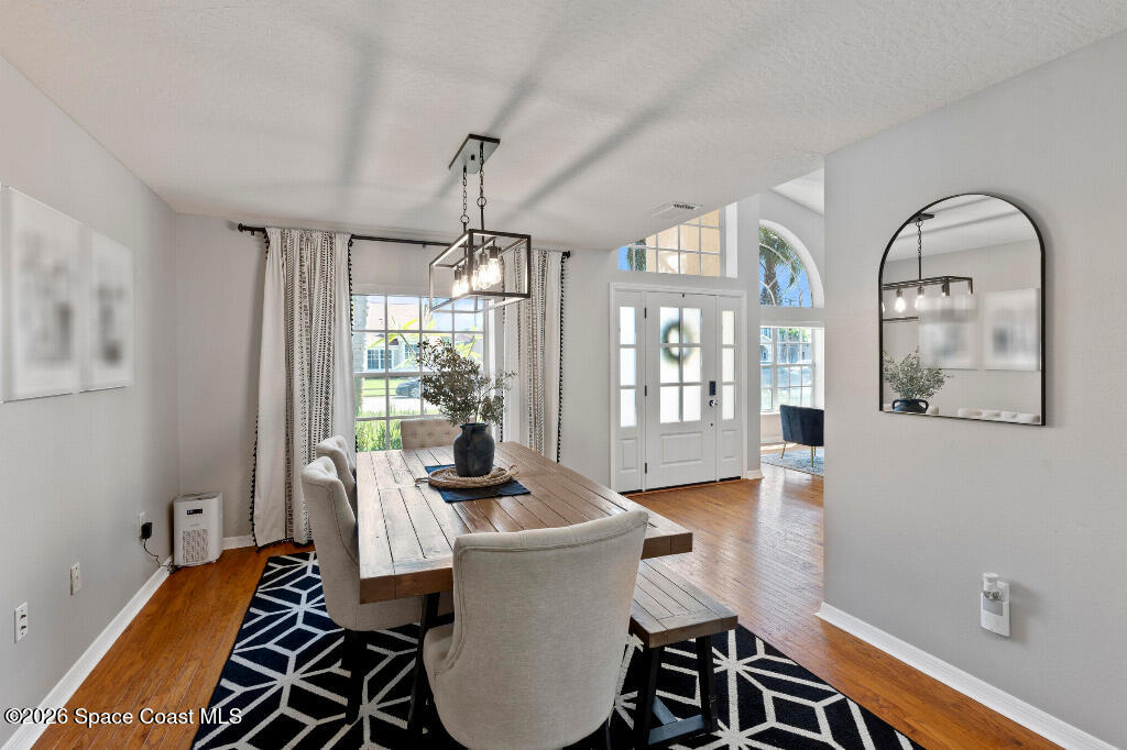 2639 Lowell Circle Melbourne, FL 32935 - Photo 12 of 45 a view of a livingroom with furniture window and wooden floor