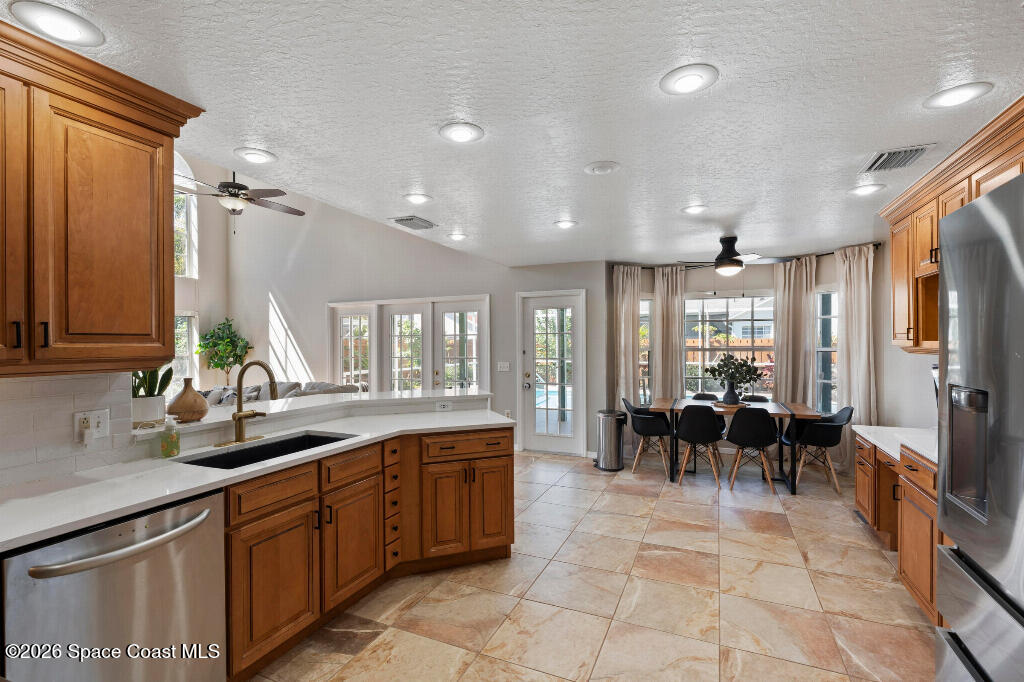 2639 Lowell Circle Melbourne, FL 32935 - Photo 18 of 45 a large kitchen with lots of counter space