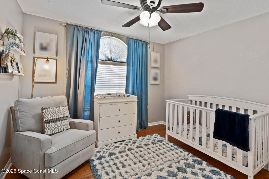 2639 Lowell Circle Melbourne, FL 32935 - Photo 35 of 45 a bedroom with furniture and a window