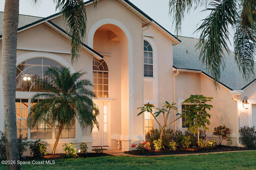 2639 Lowell Circle Melbourne, FL 32935 - Photo 43 of 45 a front view of multiple house with yard