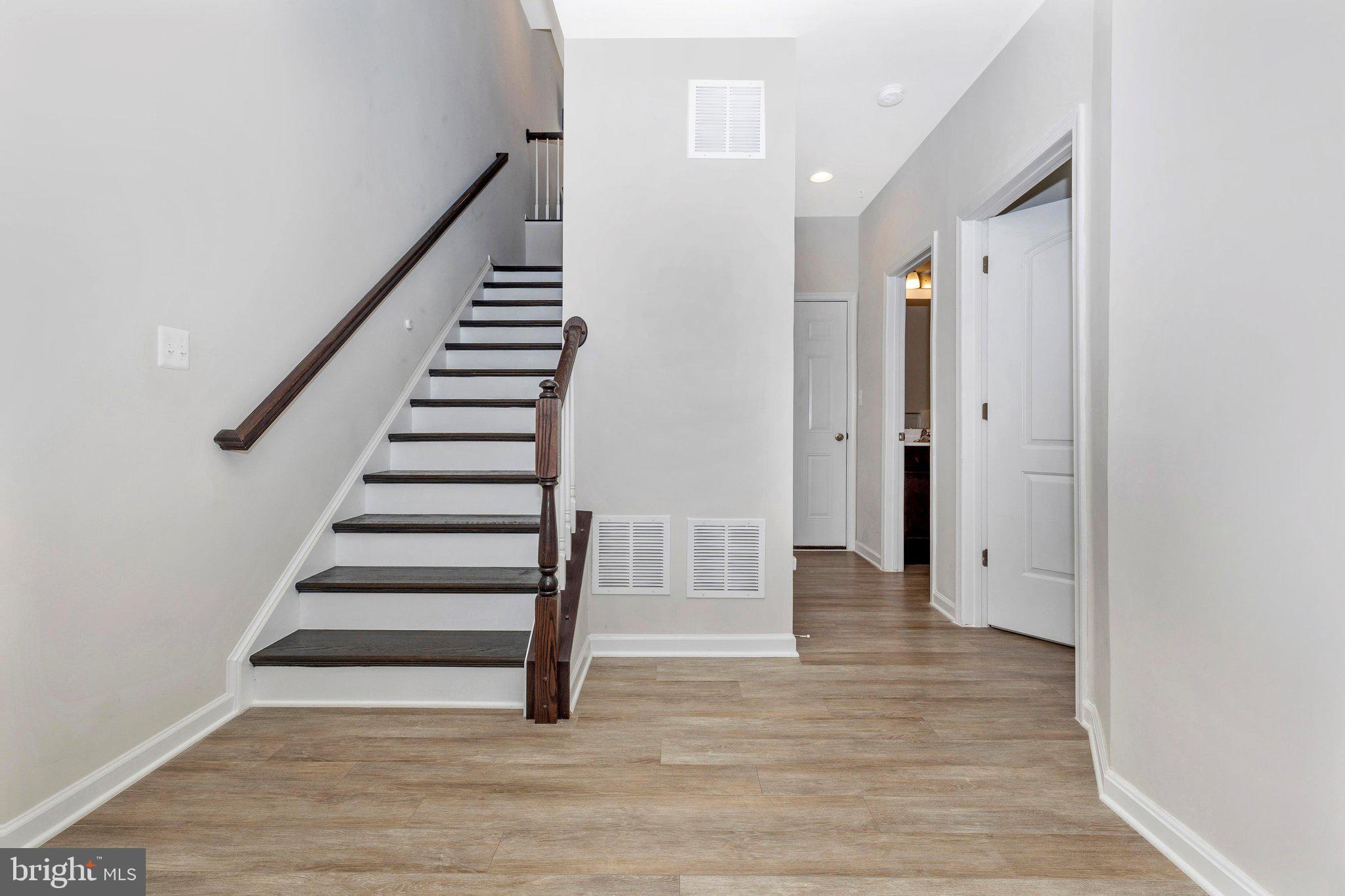 308 Spring Bank Way Frederick, MD 21701 - Photo 6 of 49 Stairs to second level.