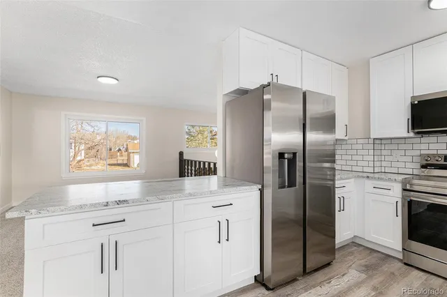 $550,000 | 1582 Quivira Drive, Denver, CO 80229