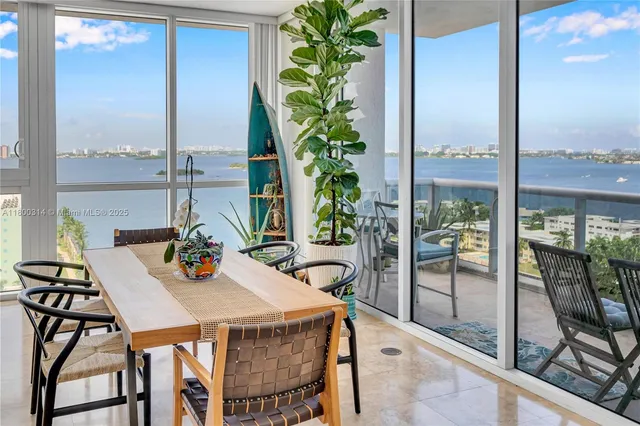 a view of an outdoor dining space with furniture