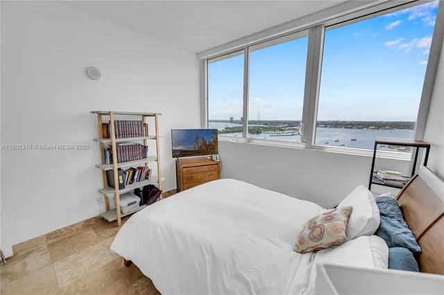 a view of a palm trees in front of a building