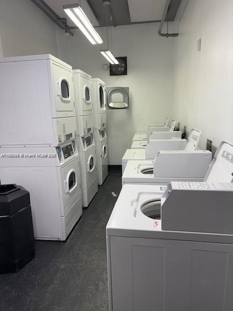650 Northeast 64th Street, Unit G608 Miami, FL 33138 - Photo 26 of 31 a utility room with dryer and washer