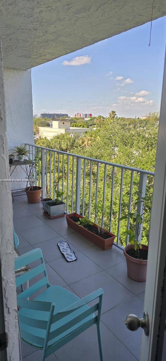 650 Northeast 64th Street, Unit G608 Miami, FL 33138 - Photo 8 of 31 a view of a balcony with lake view