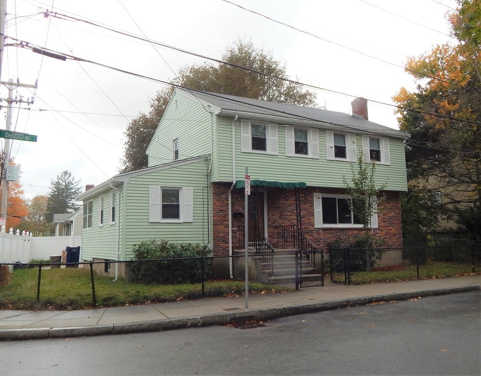 115 Desoto Road Boston, MA 02132 - Photo 21 of 21 a front view of a house with a garden