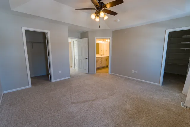 a bathroom with a shower and a sink