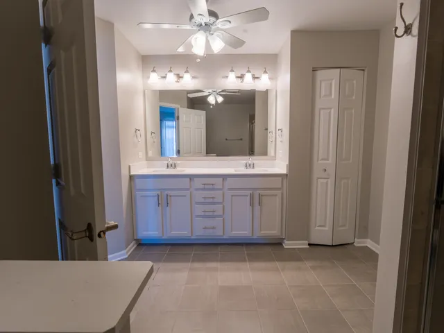 a view of an empty room and a window