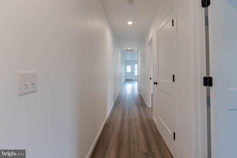 310-312 West Clinton Street Lock Haven, PA 17745 - Photo 13 of 30 a view of a hallway with wooden floor