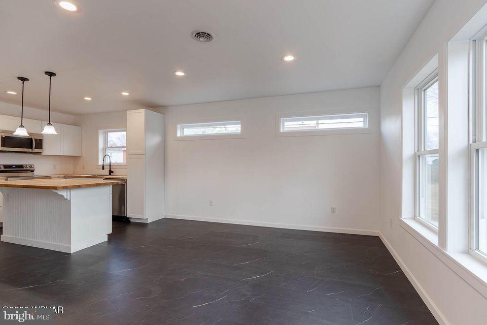 310-312 West Clinton Street Lock Haven, PA 17745 - Photo 18 of 30 a view of a kitchen with a sink and a stove top oven
