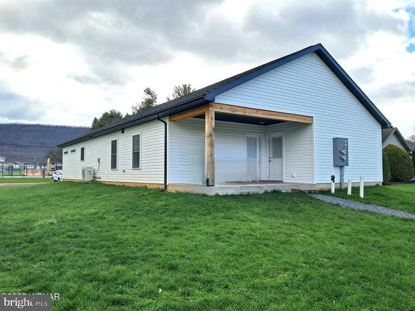 310-312 West Clinton Street Lock Haven, PA 17745 - Photo 2 of 30 a view of a backyard with plants and a garden