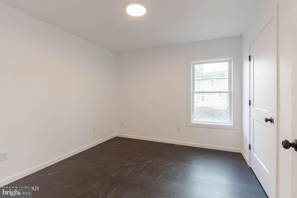 310-312 West Clinton Street Lock Haven, PA 17745 - Photo 24 of 30 an empty room with a window