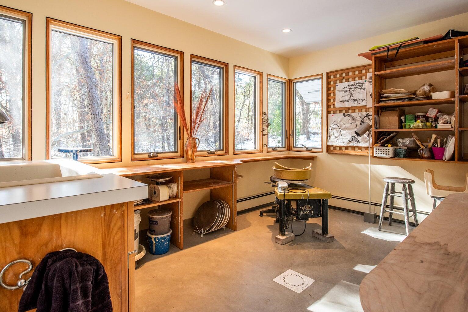 195 King Phillip Road Wellfleet, MA 02667 - Photo 44 of 62 a view of a livingroom with workspace and a window