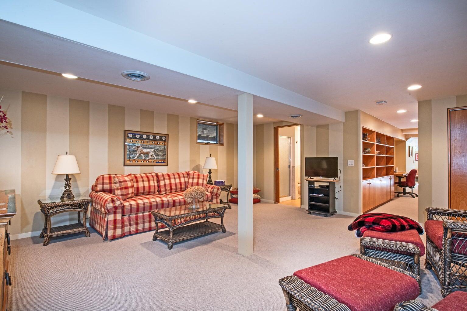 195 King Phillip Road Wellfleet, MA 02667 - Photo 50 of 62 a bedroom with furniture and a couch