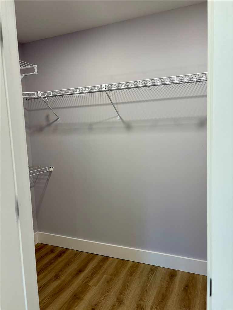 110 Ware Street Seneca, SC 29678 - Photo 12 of 24 Functional closet offers ample storage with durable wire shelving and easy-care flooring.