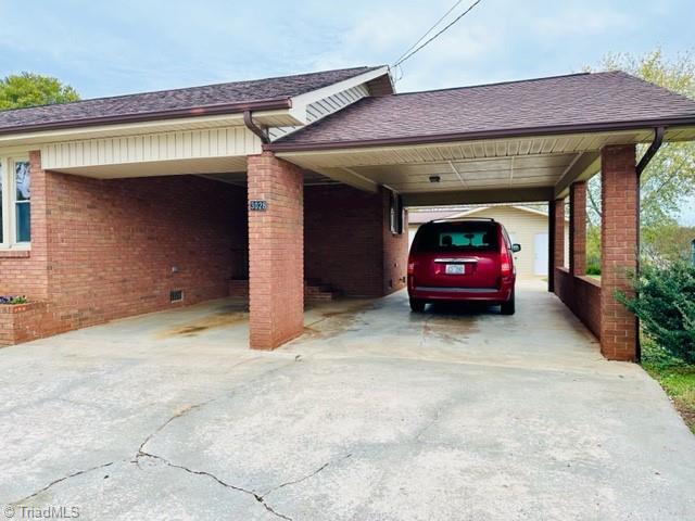 3028 Sparta Road North Wilkesboro, NC 28659 - Photo 3 of 24 Spacious carport and additional covered area.