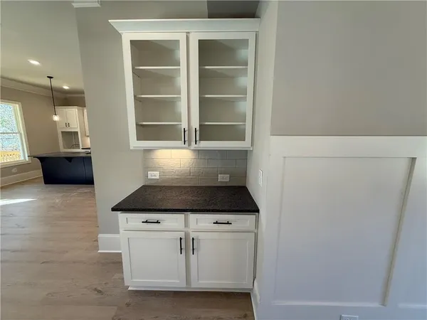 a large kitchen with kitchen island a sink stove and refrigerator