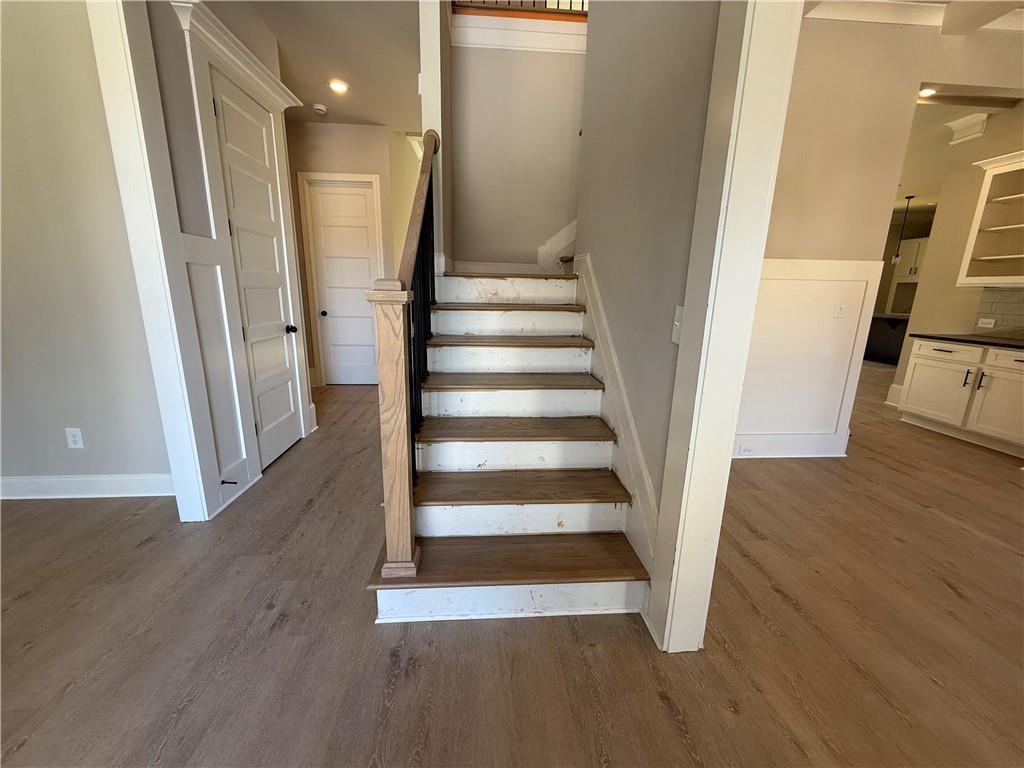 3844 Cheyenne Lane Jefferson, GA 30549 - Photo 21 of 36 a view of entryway with wooden floor and stairs